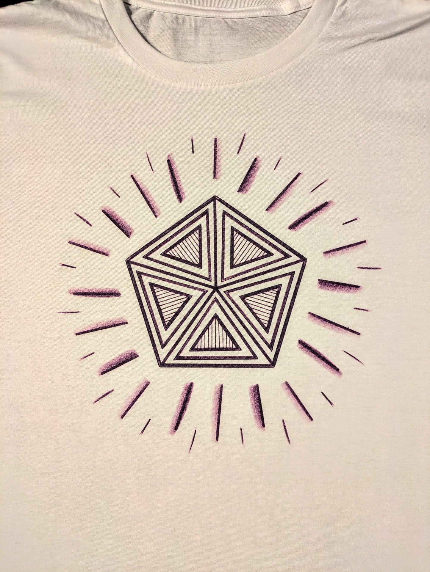 White tshirt with purple pentagon design with radiating purple lines