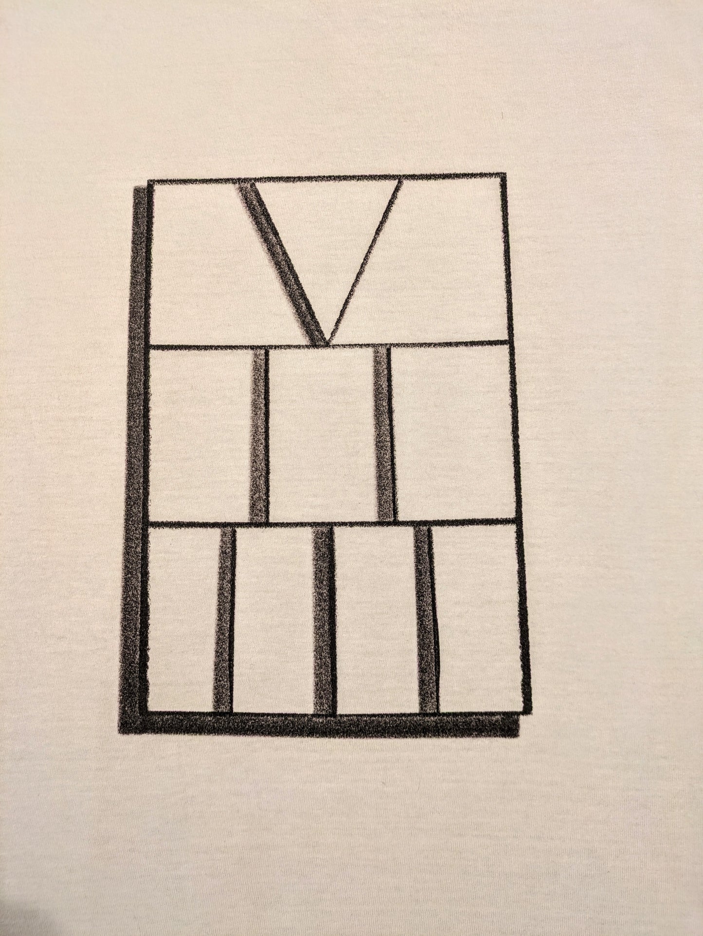 Fine line rectangle with roman numerals five two three aligned vertically on white shirt