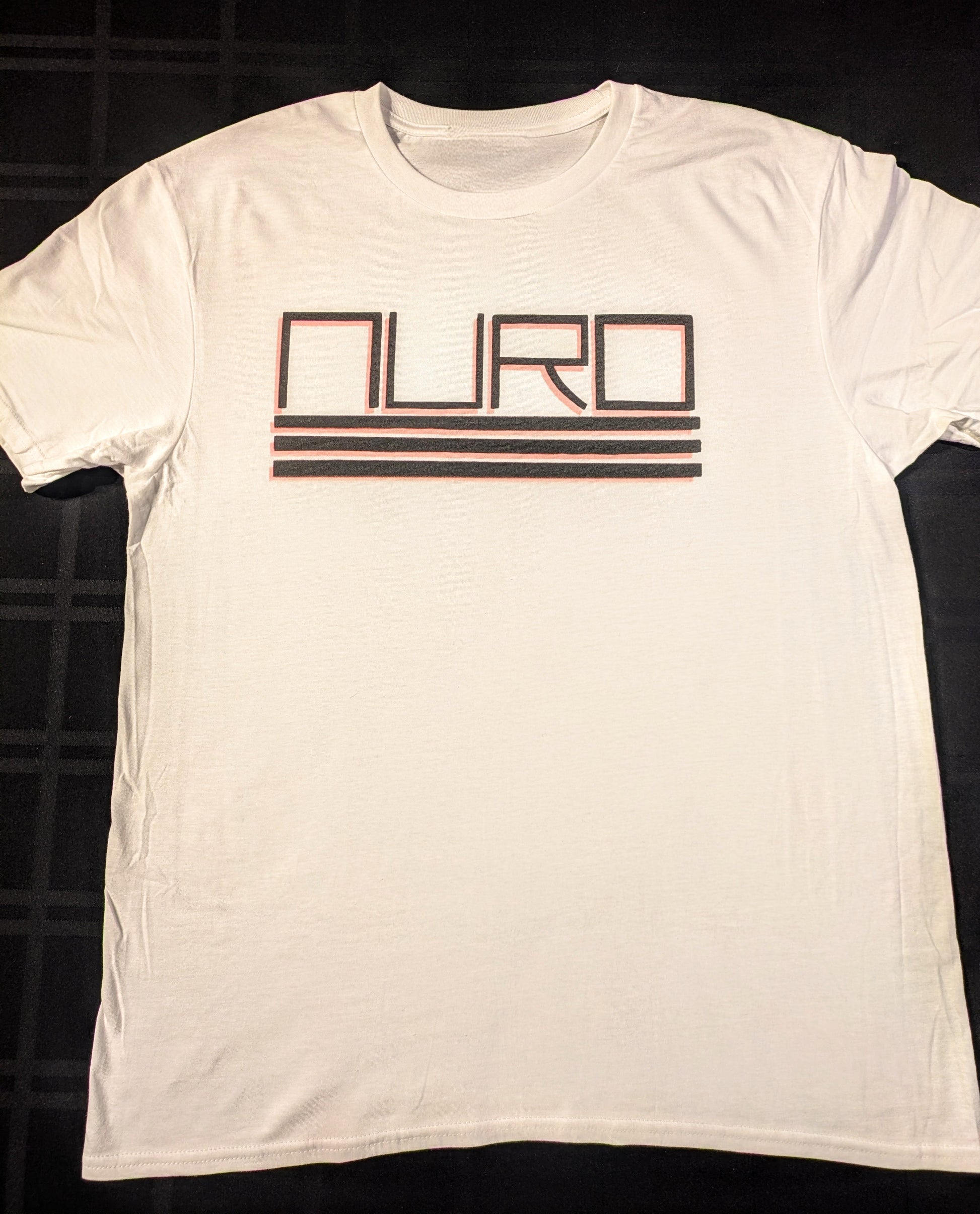 White t-shirt with 'NURO' logo with three lines underneath and a red drop shadow
