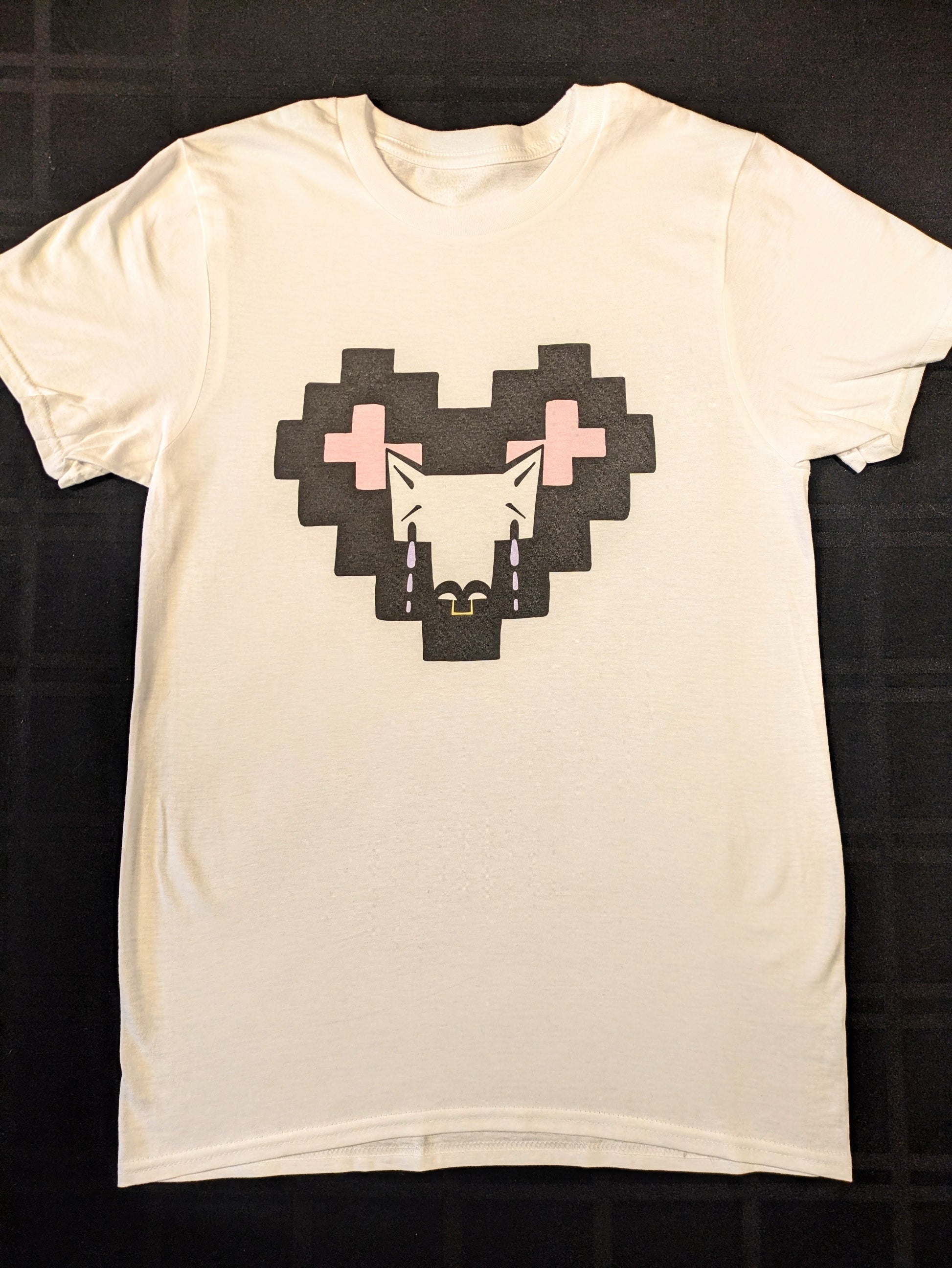 White shirt with a pixel heart and crying Coyote character